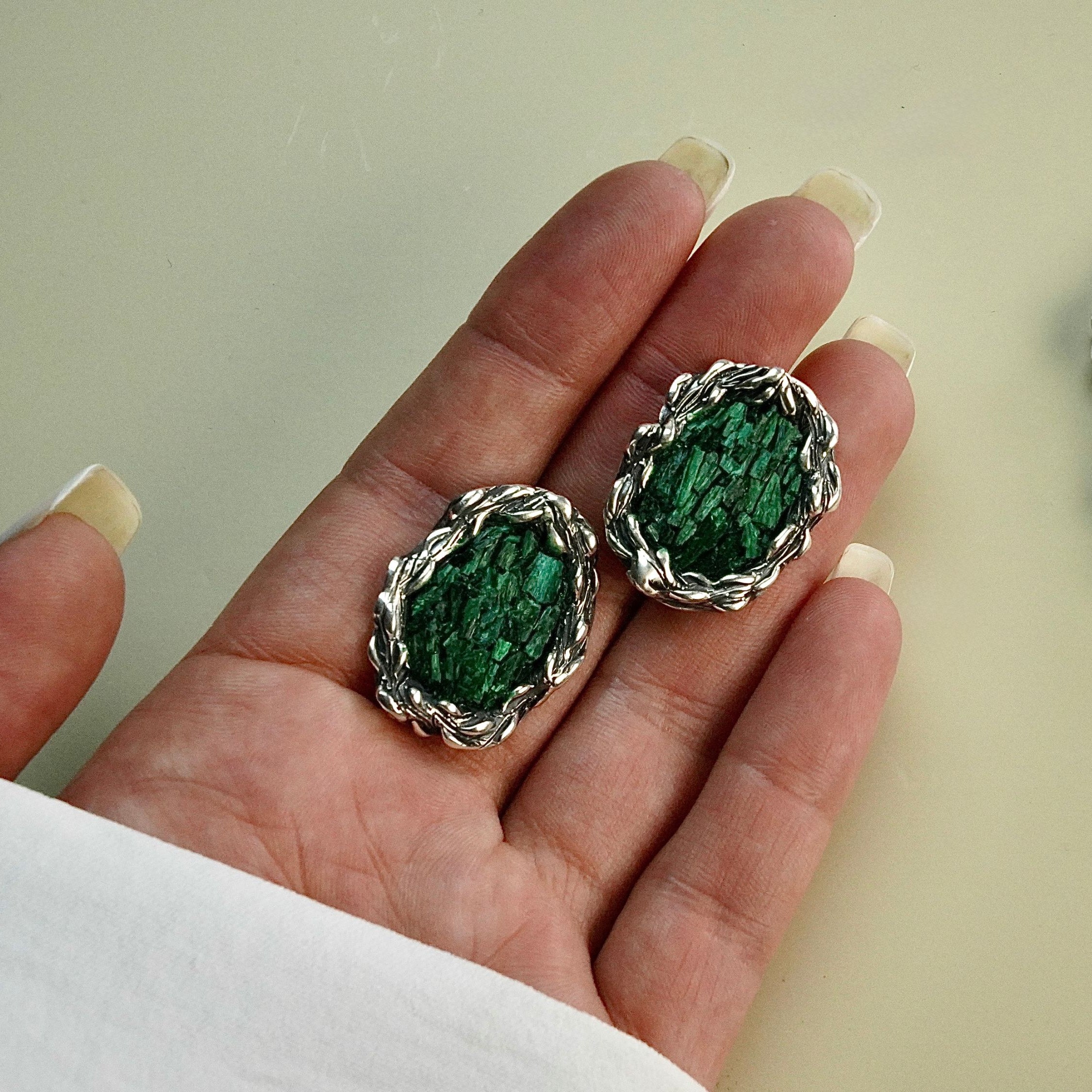 Detailed variation malachite earrings green gemstone texture macro shot