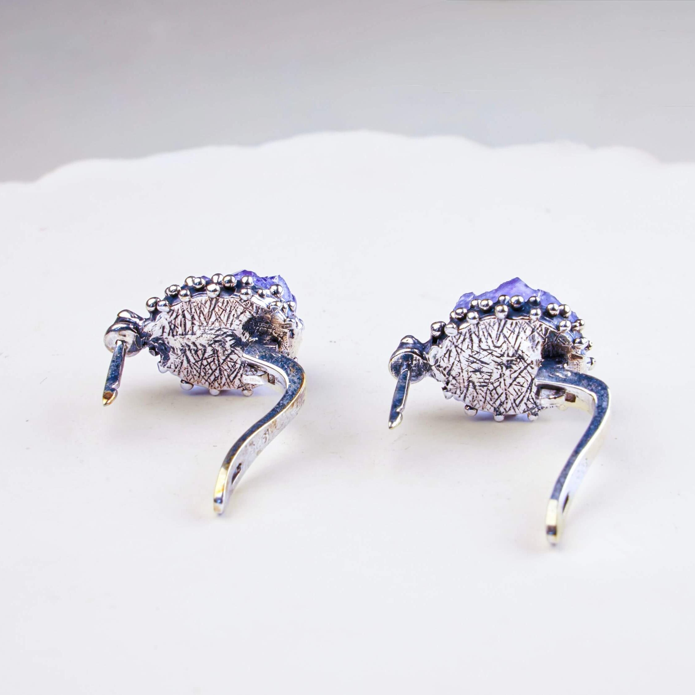 Rear view of the amethyst earring, showcasing the secure 925 sterling silver leverback closure and artisan craftsmanship