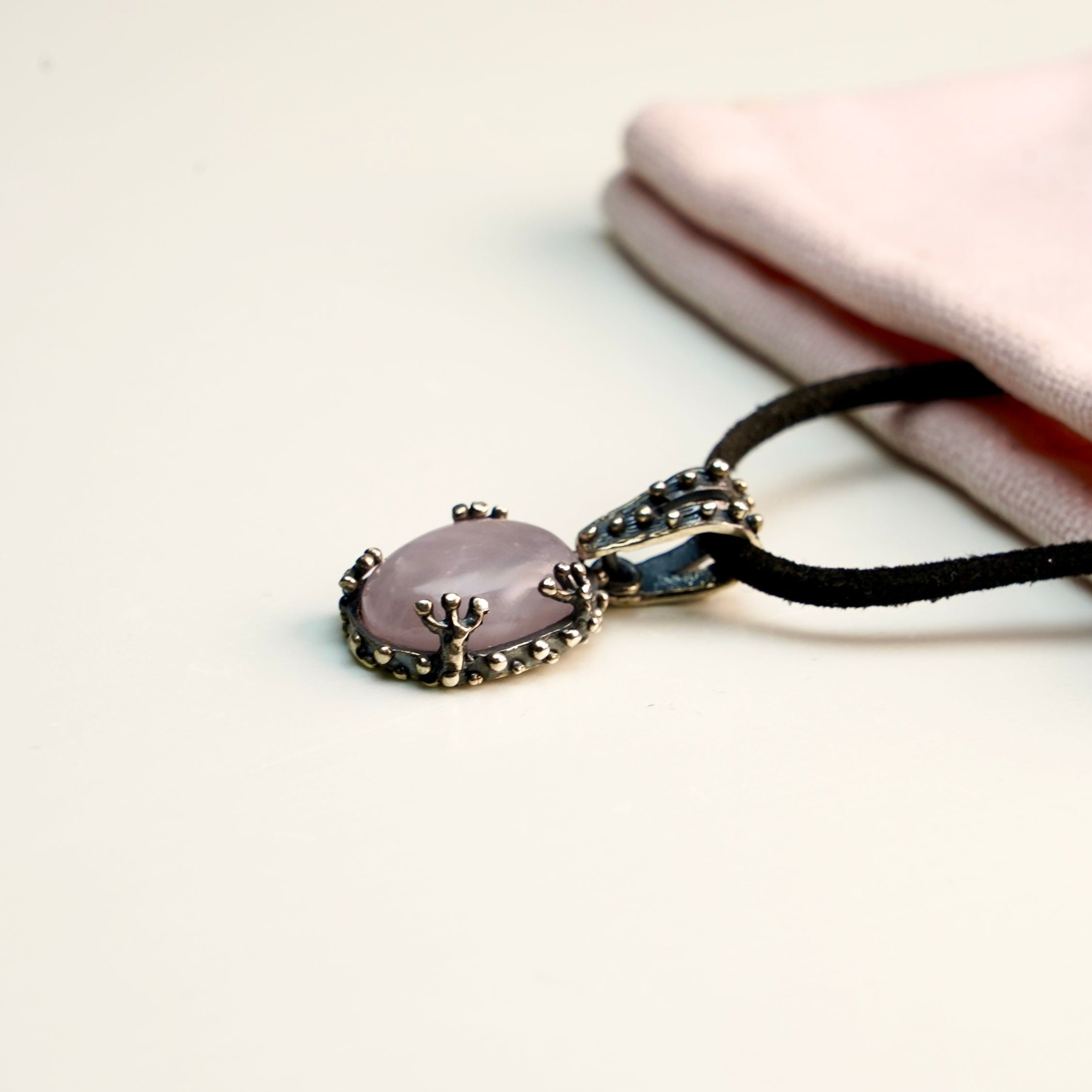 Rose quartz necklace lifestyle wear feminine pink pendant elegant everyday jewelry