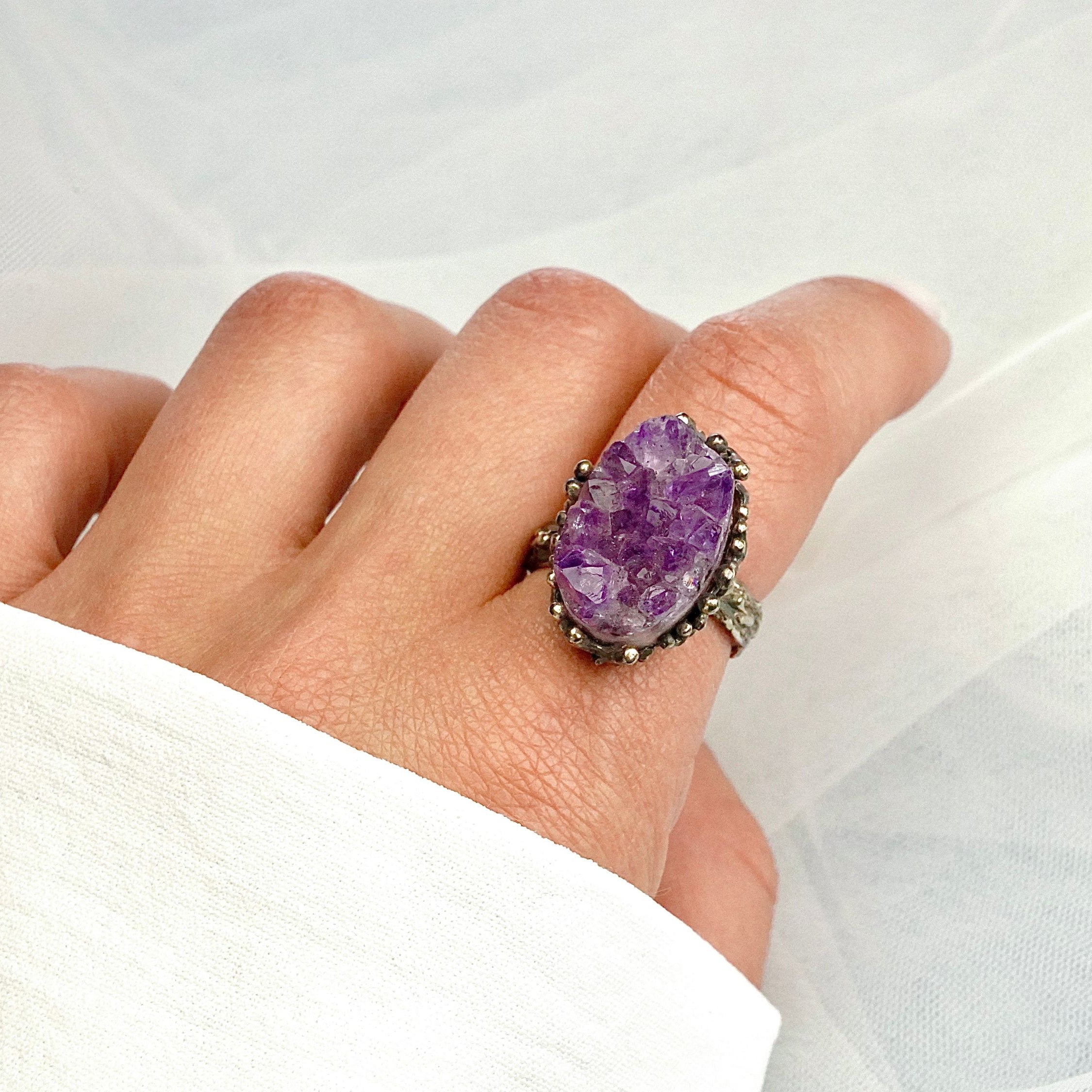 Lifestyle amethyst adjustable ring purple gemstone jewelry soft aesthetic composition