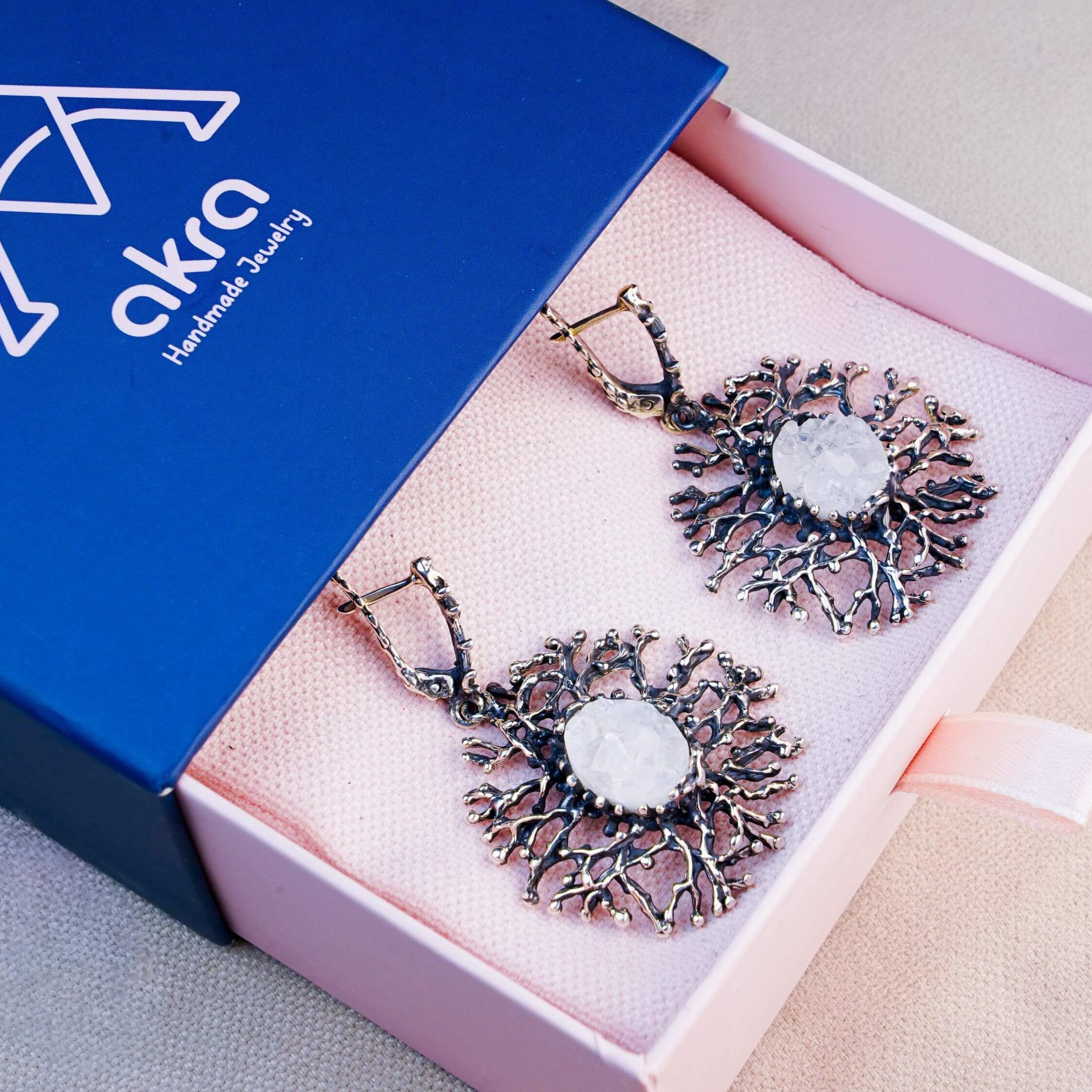 Akra Gems premium jewelry box with a Moonstone earrings set, elegantly packaged for a special gift experience