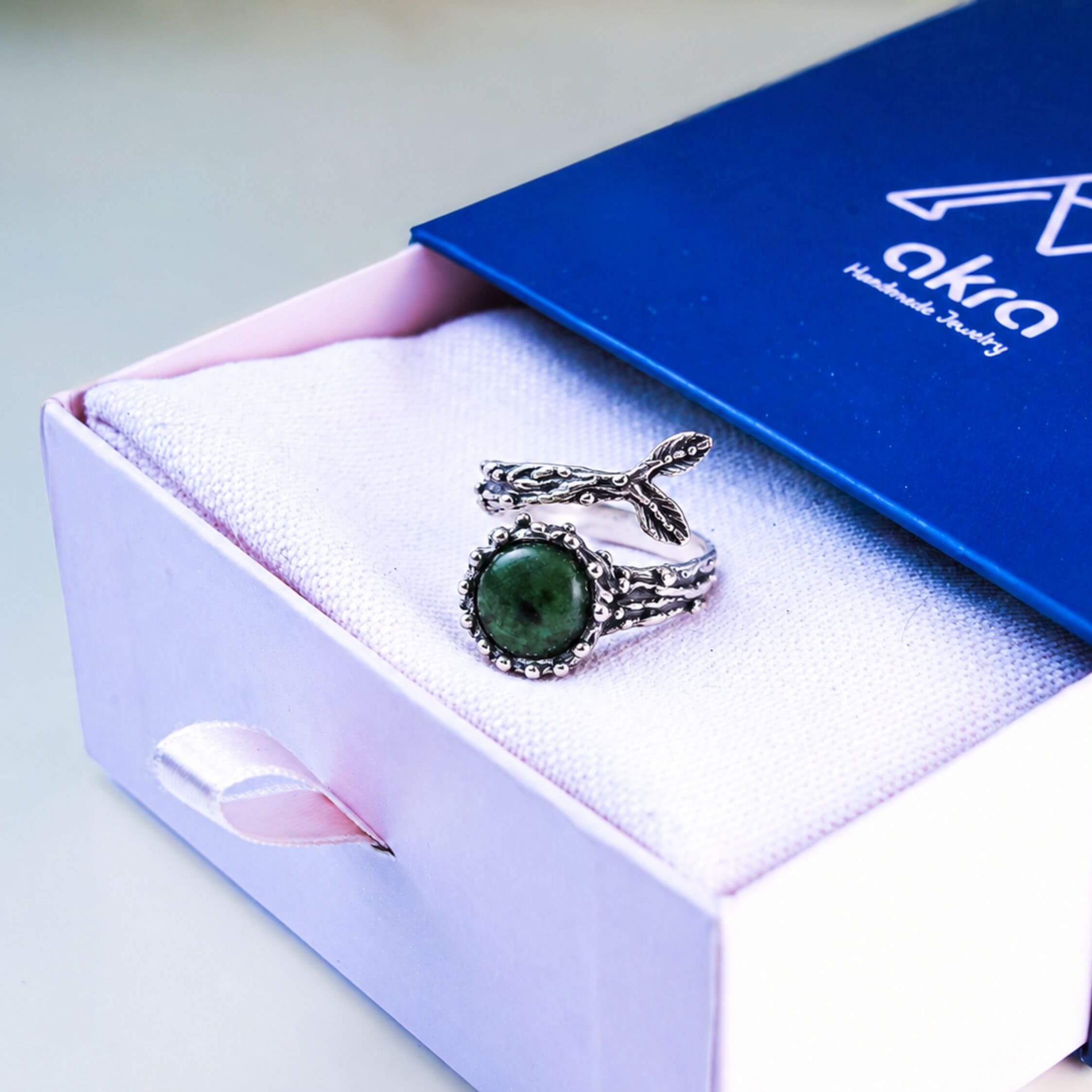 The raw Jade ring presented in Akra Gems signature gift box and luxury pouch, ready for premium gifting.