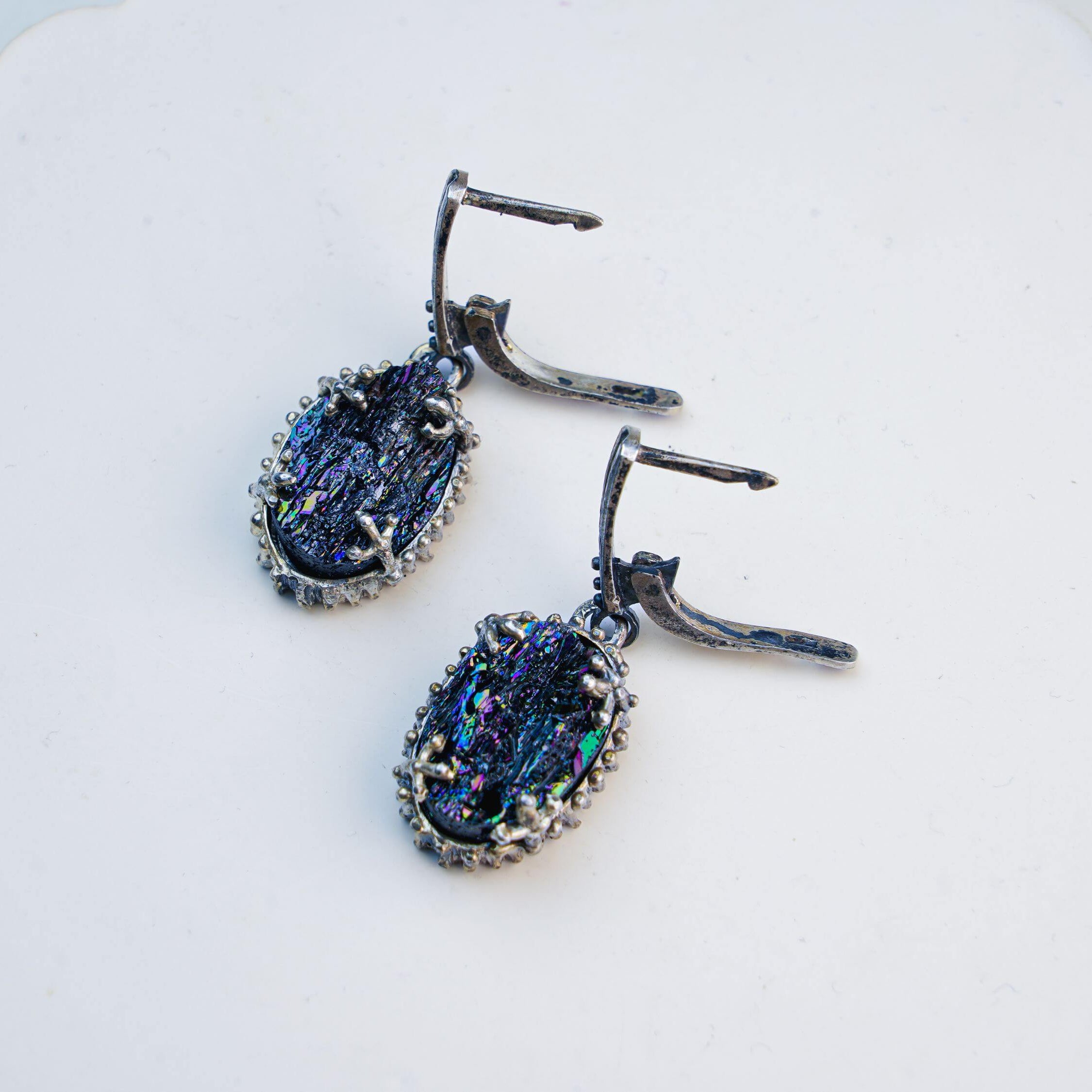 A pair of artisan-made Black Tourmaline earrings, showcasing the unique beauty of stones handcrafted in Tbilisi by Akra Gems