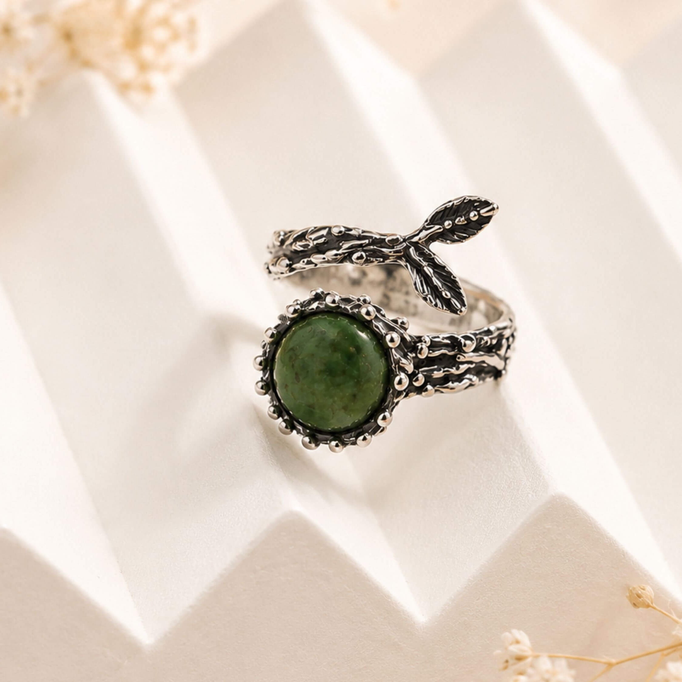 Close-up of the oxidized silver finish and artisan metalwork on the Jade ring, showcasing Akra Gems' expert craftsmanship.