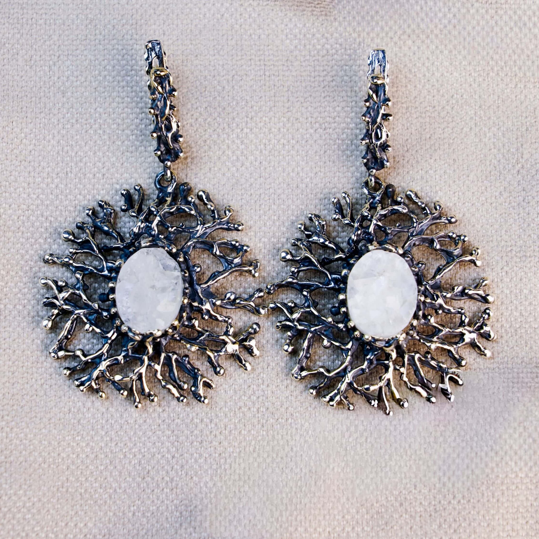 Symmetrical front view of both Moonstone earrings, emphasizing the unique, nature-inspired sterling silver textures and stone clarity