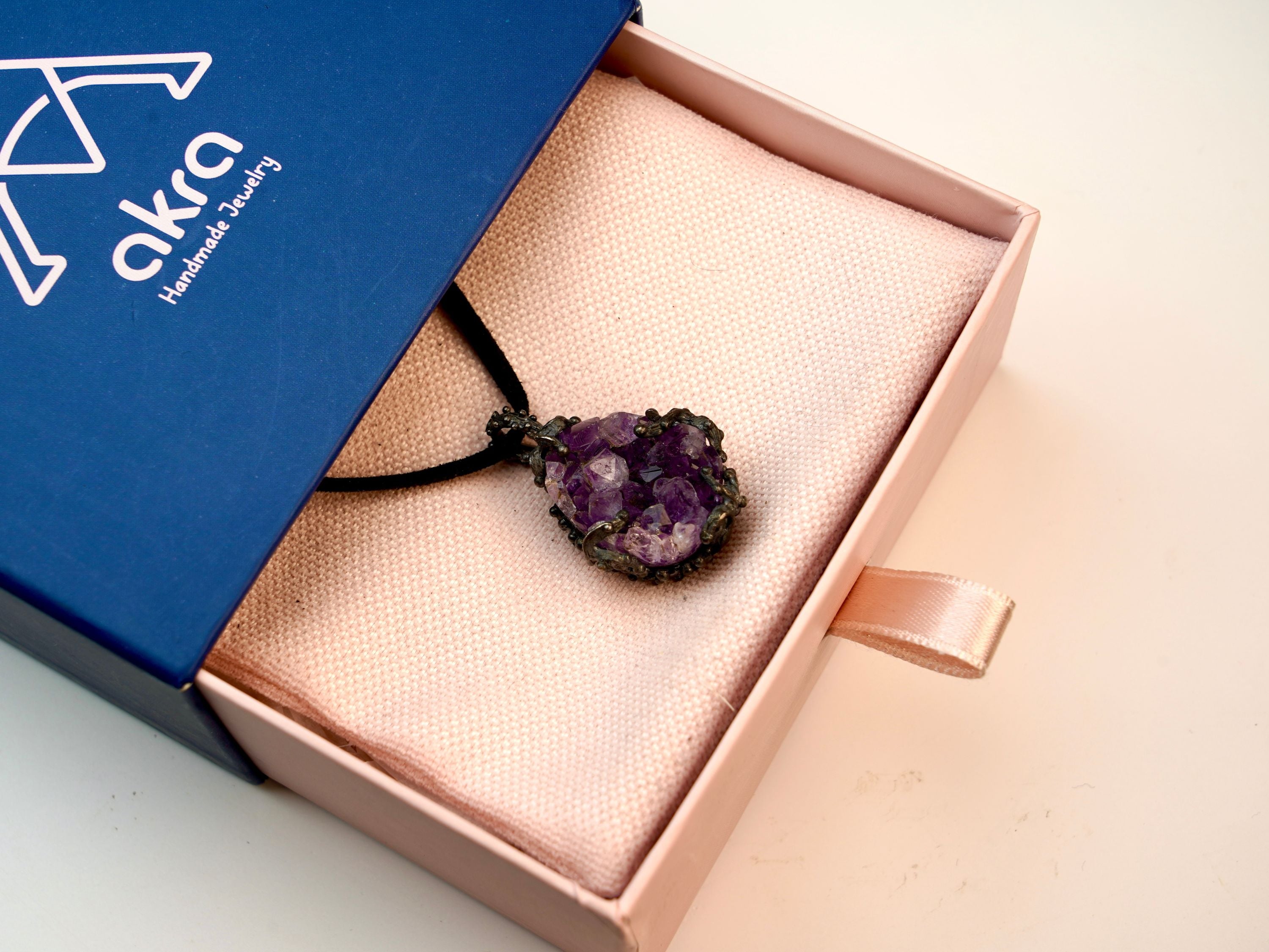 amethyst pendant in gift box, jewelry packaging ready for gift