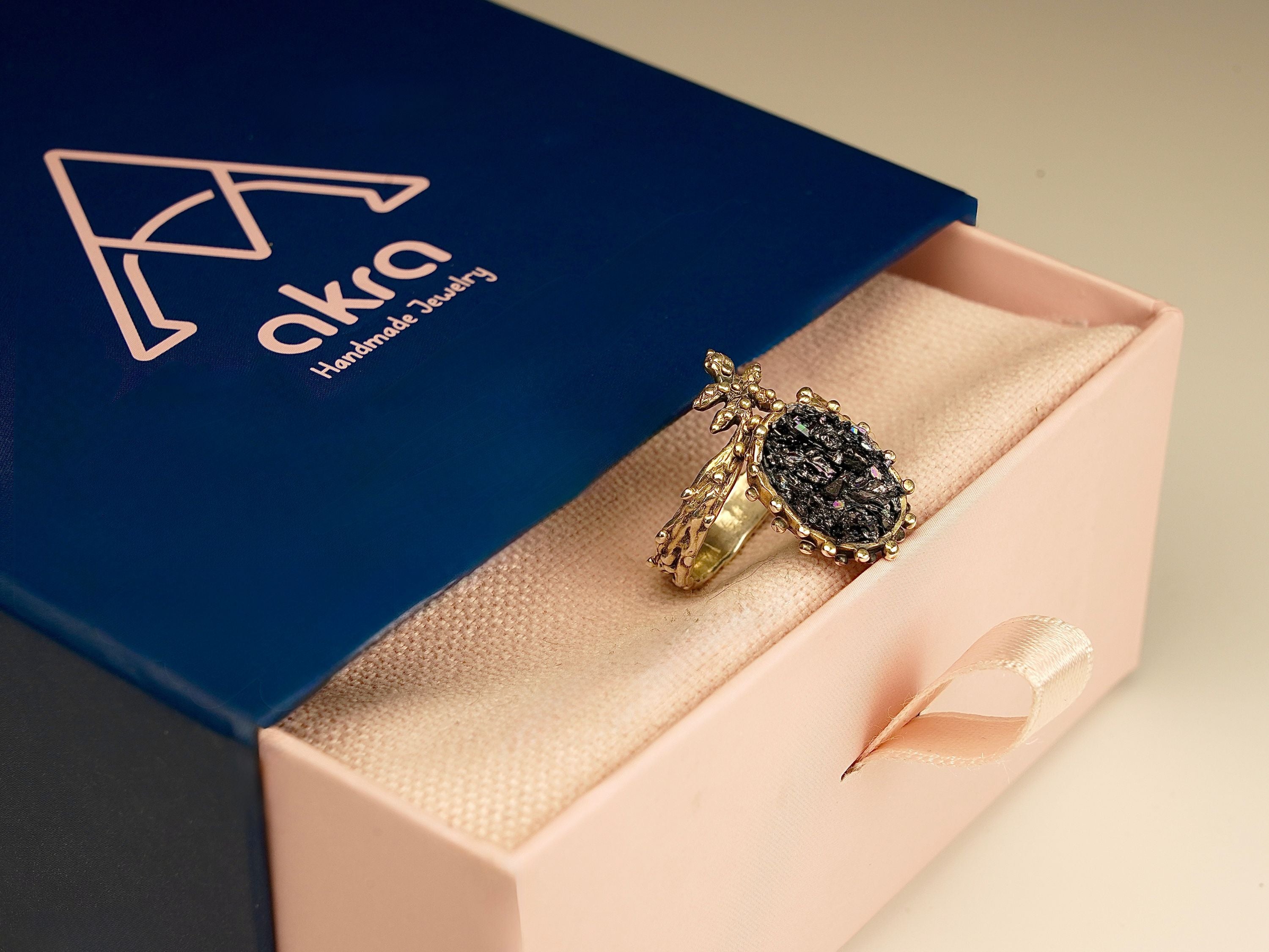 Black tourmaline ring in gift box packaging premium jewelry ready for gift