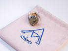 Pyrite ring on jewelry pouch branded packaging presentation akra jewelry