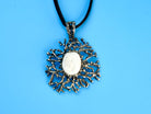 moonstone statement necklace on display, organic silver artistic pendant