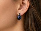 Black moissanite earrings worn on ear leverback sterling silver dark gemstone