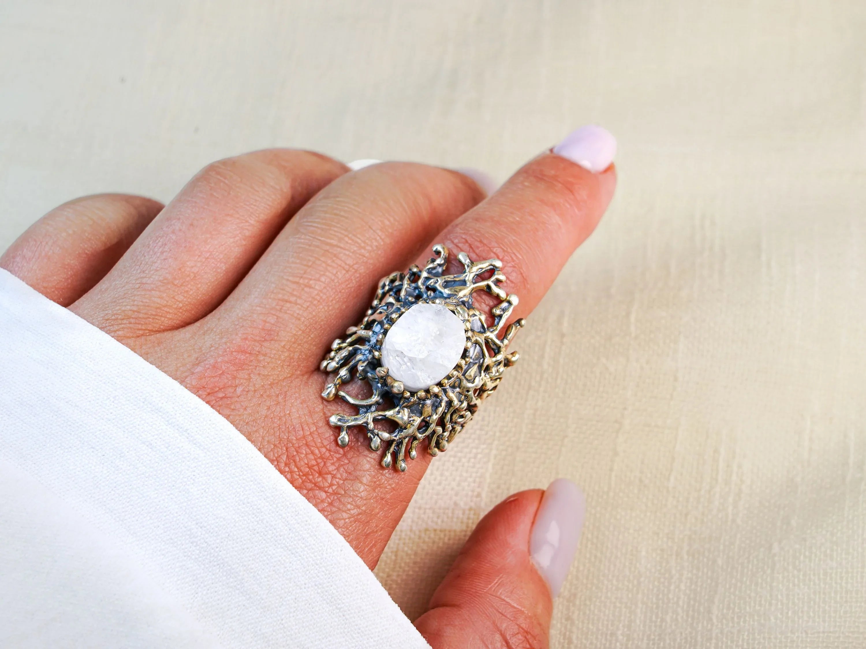 Moonstone statement ring worn on hand sterling silver organic sculptural design