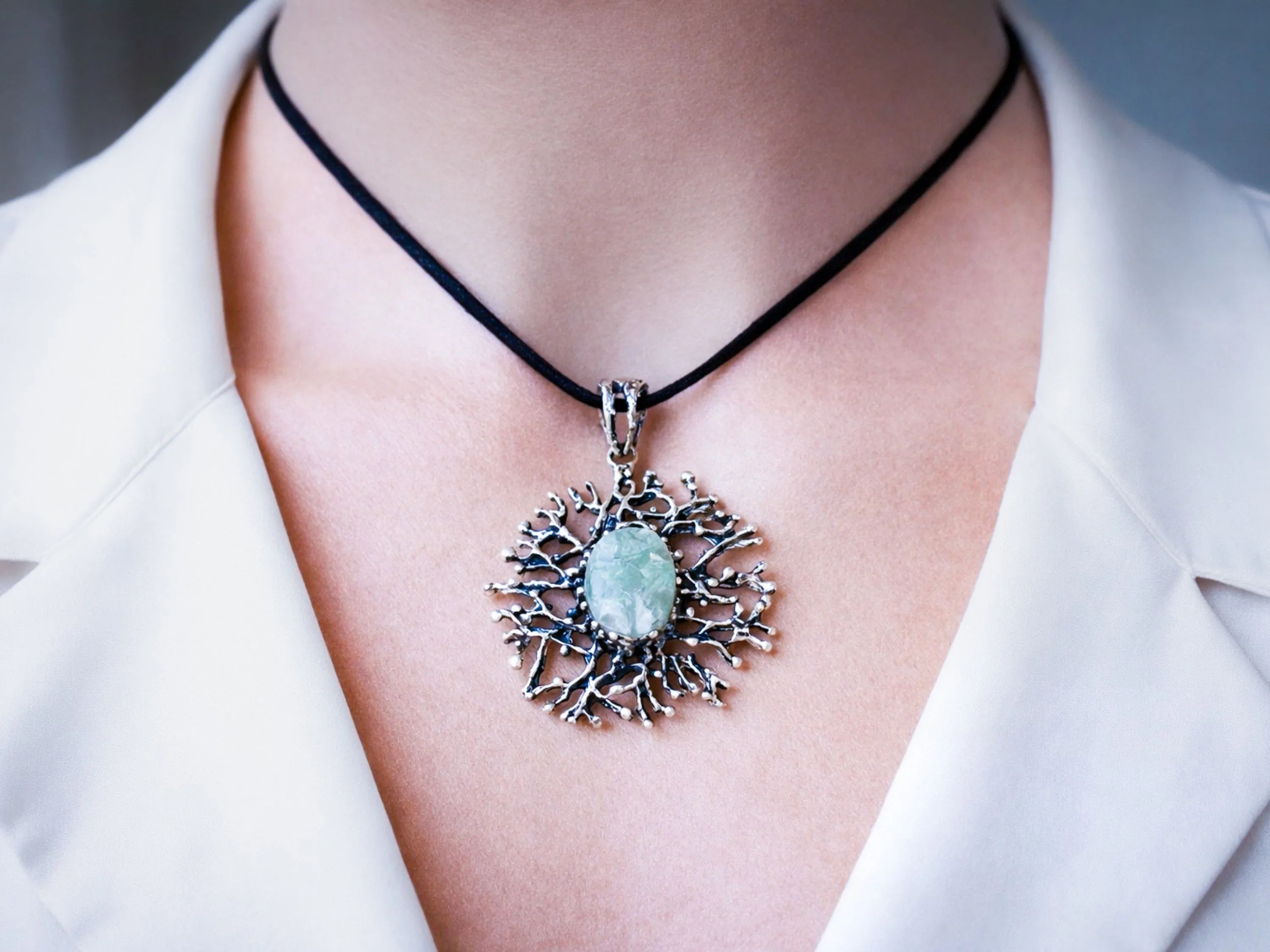 Aquamarine necklace worn on neck sterling silver pendant blue gemstone jewelry