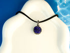 lapis lazuli necklace on display, elegant blue gemstone sterling silver pendant