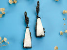 Moonstone earrings raw white crystal silver drop earrings luxury clean hero image