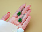 Jade earrings on hand size reference green gemstone silver earrings