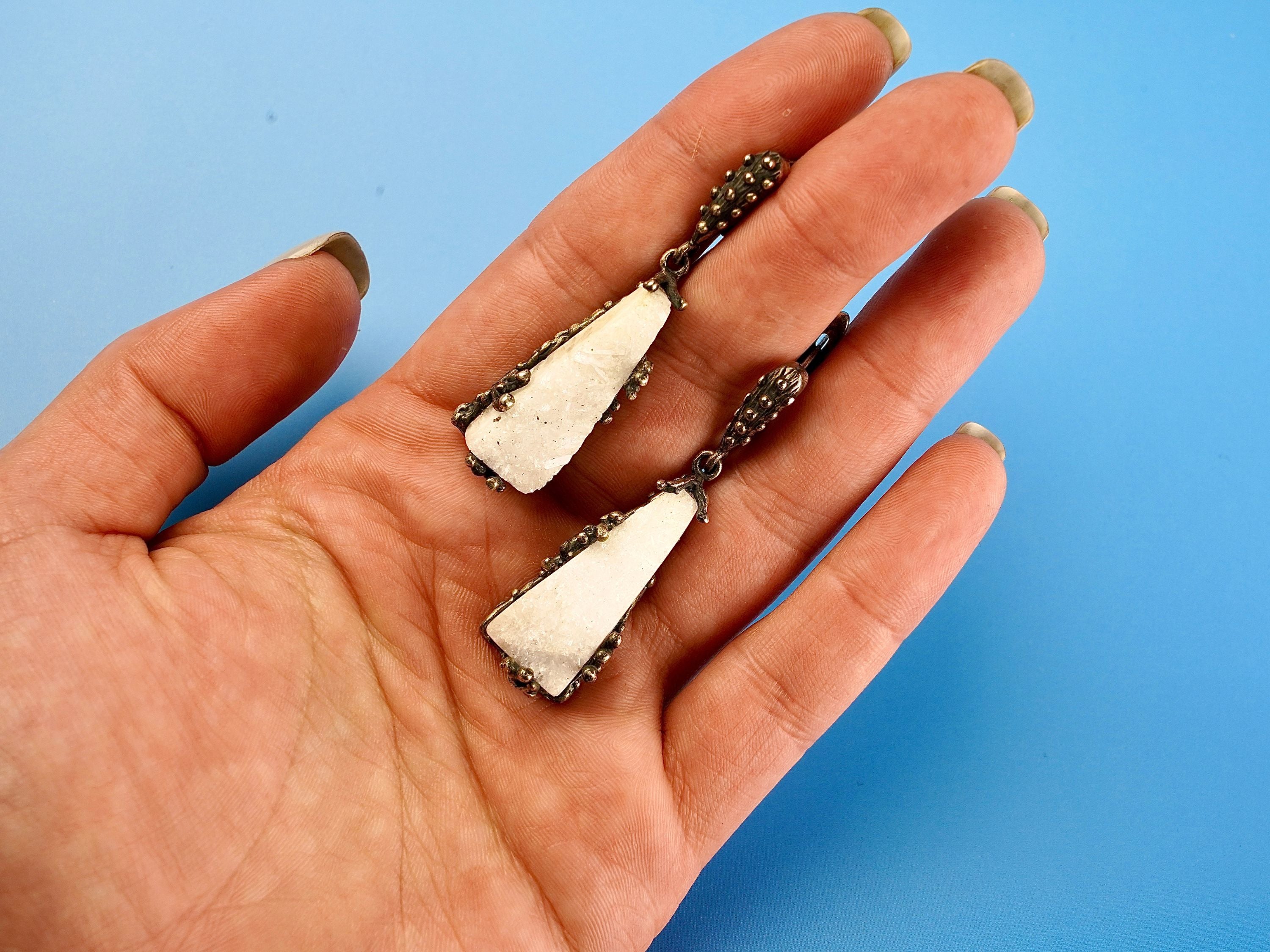 Moonstone earrings on hand size reference raw white crystal silver earrings