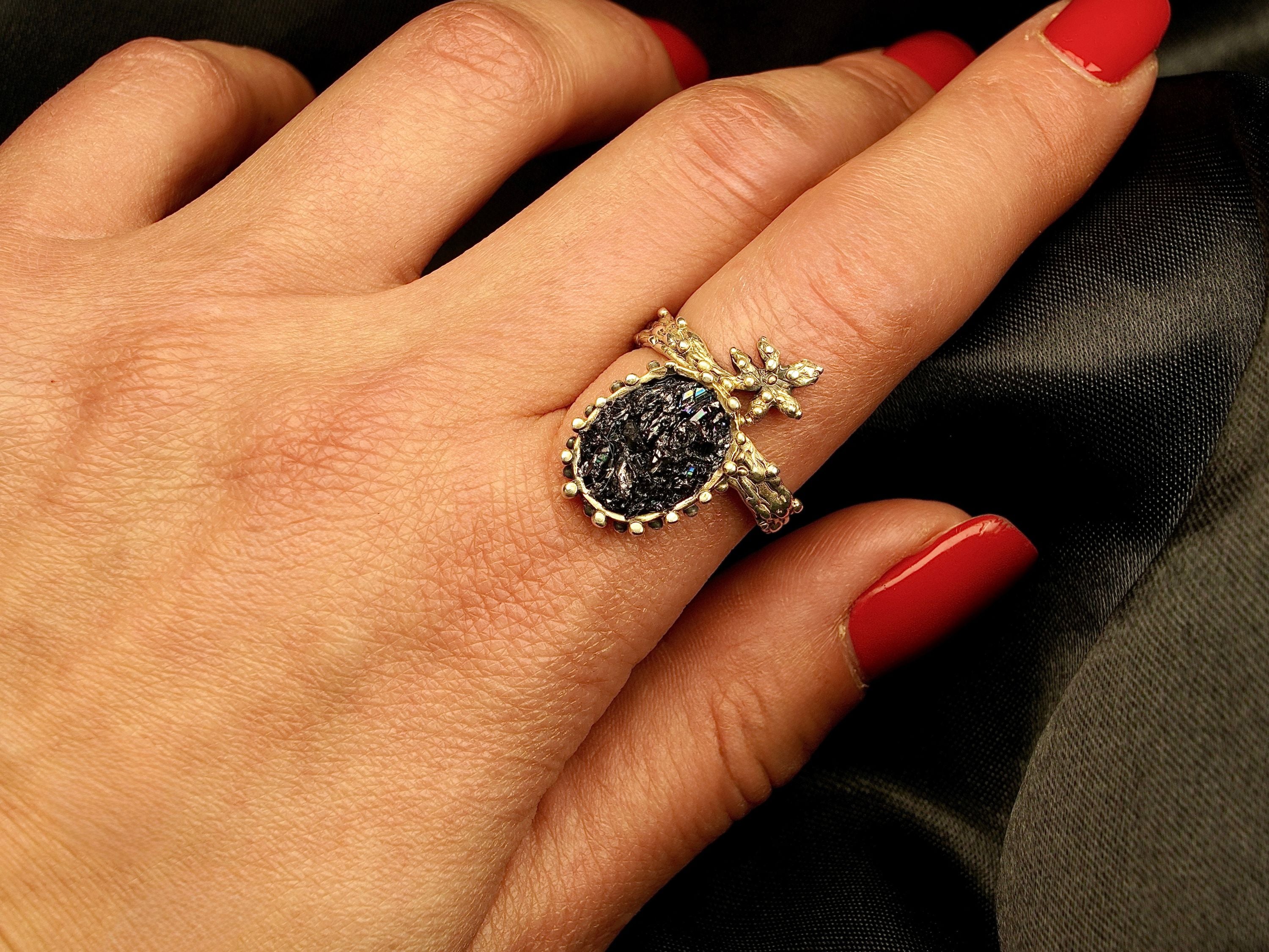 Black tourmaline statement ring on hand size reference ornate silver adjustable ring