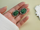 Malachite earrings on hand size reference green stone silver earrings