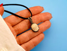 moonstone necklace on hand glowing pendant silver jewelry