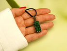 malachite necklace on hand green gemstone pendant size reference
