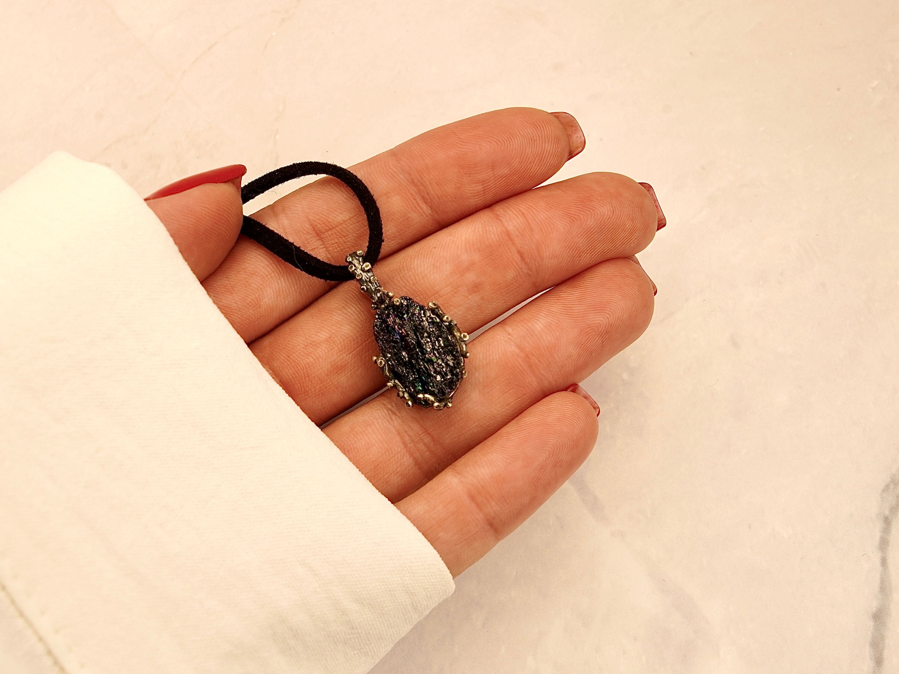 black tourmaline necklace on hand size reference raw crystal jewelry
