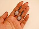 rose quartz earrings on hand, size reference pink gemstone drop earrings