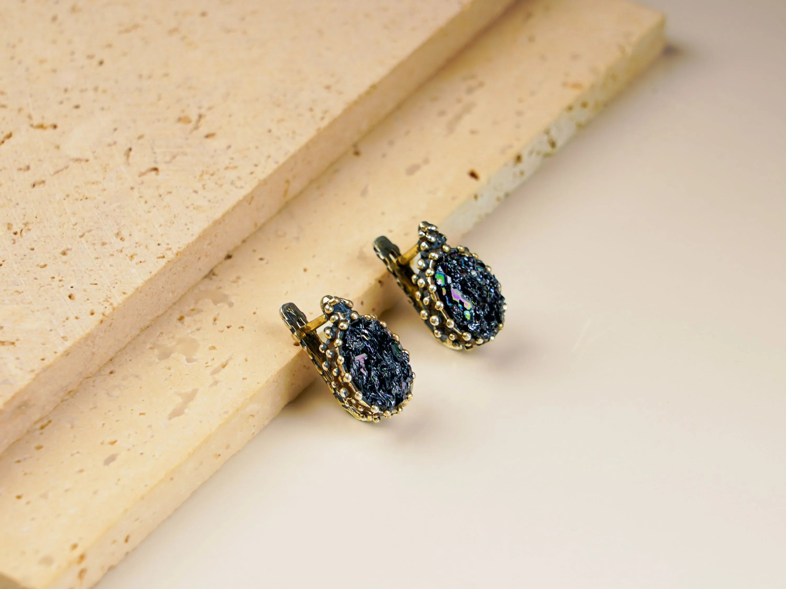 Black moissanite earrings top view sterling silver leverback dark gemstone