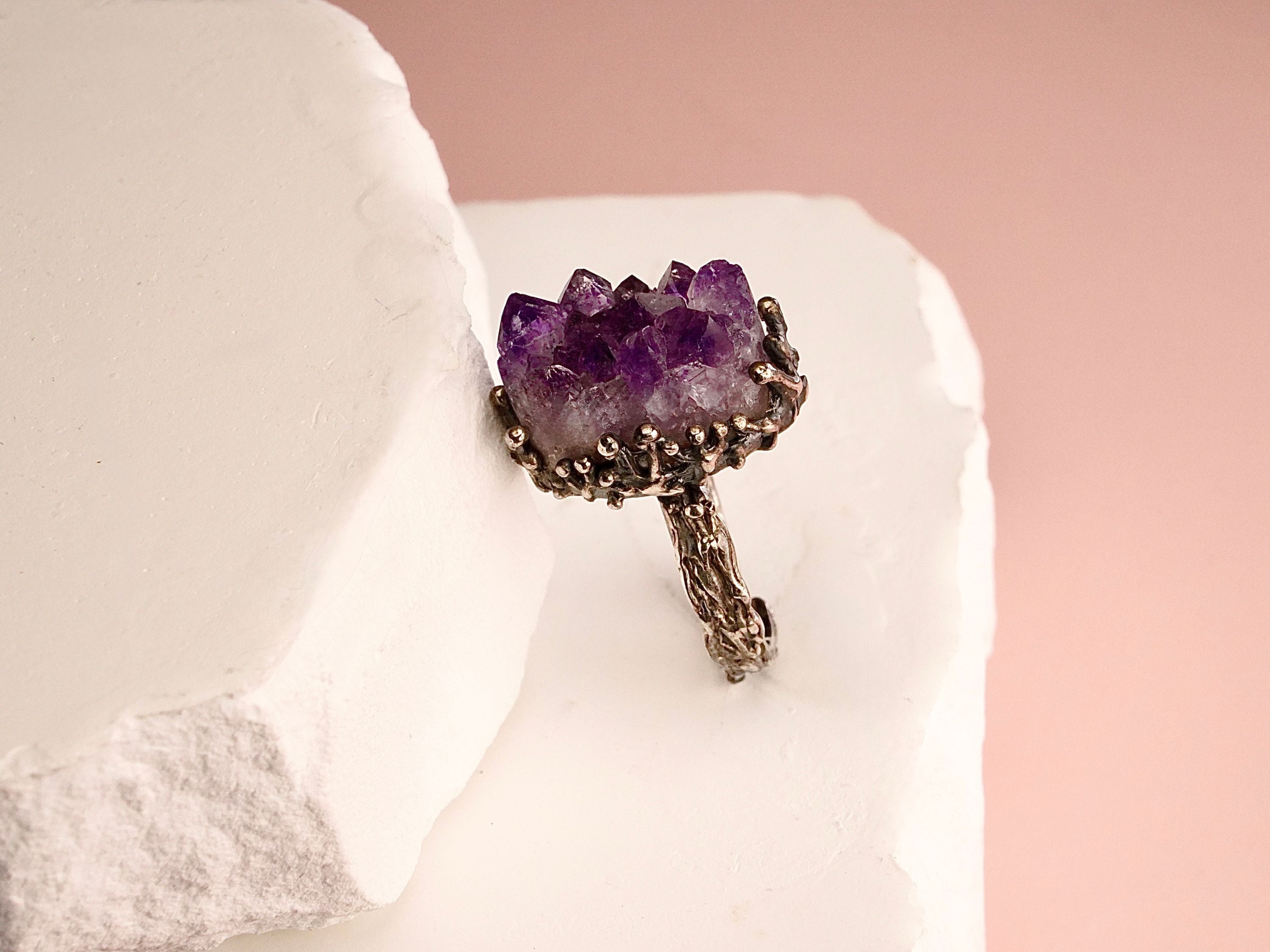 Close up raw amethyst crystal texture purple gemstone detail adjustable sterling silver ring