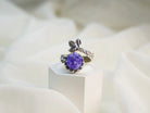 Amethyst ring on display minimalist jewelry aesthetic purple gemstone