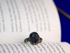 Close up raw tourmaline stone texture black crystal detail adjustable sterling silver ring
