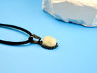moonstone pendant close up glowing gemstone silver necklace