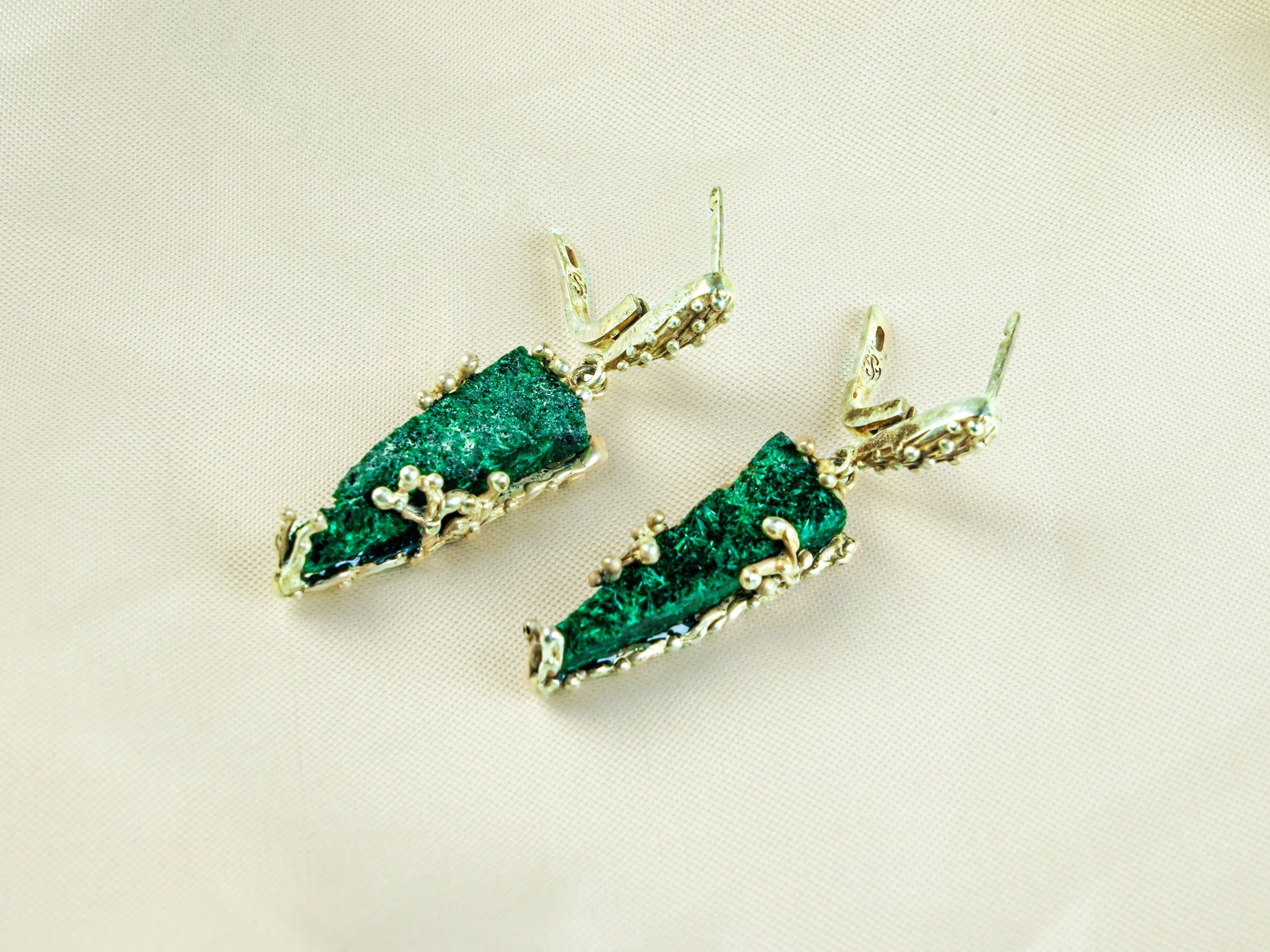 Malachite earrings angled view natural green texture statement jewelry