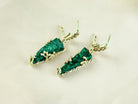 Malachite earrings angled view natural green texture statement jewelry