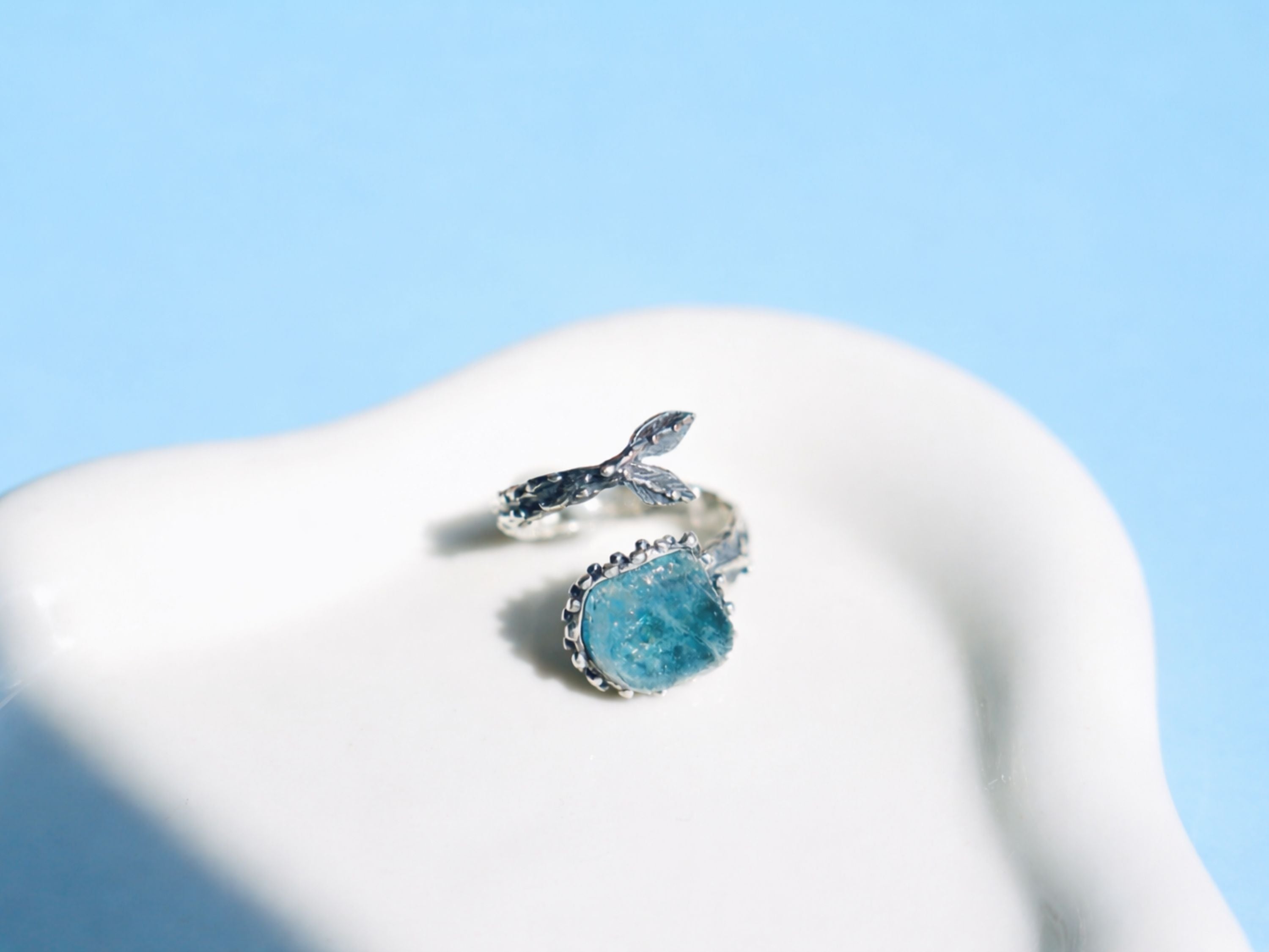 Close up aquamarine stone texture blue crystal detail adjustable sterling silver ring