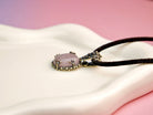Rose quartz necklace close up detail soft pink gemstone texture sterling silver