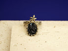 Close up black tourmaline raw gemstone texture detail sterling silver ring