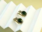 jade earrings angle view green gemstone sterling silver earrings