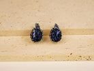Black moissanite earrings front view dark sparkle sterling silver jewelry