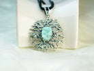 Aquamarine pendant close up sterling silver handcrafted jewelry detail