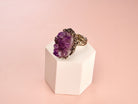 Clean front view amethyst ring raw purple crystal silver statement jewelry composition