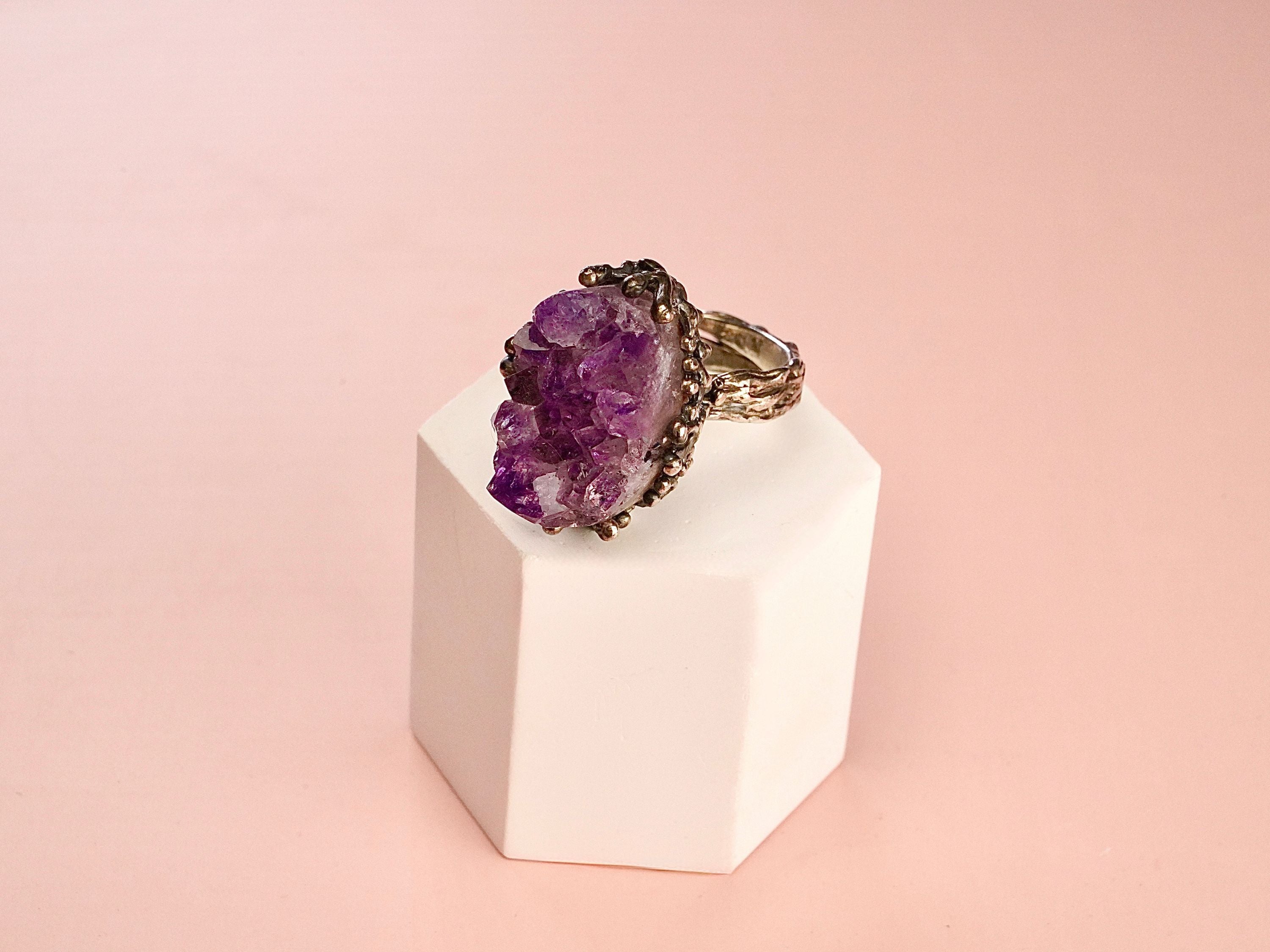 Clean front view amethyst ring raw purple crystal silver statement jewelry composition