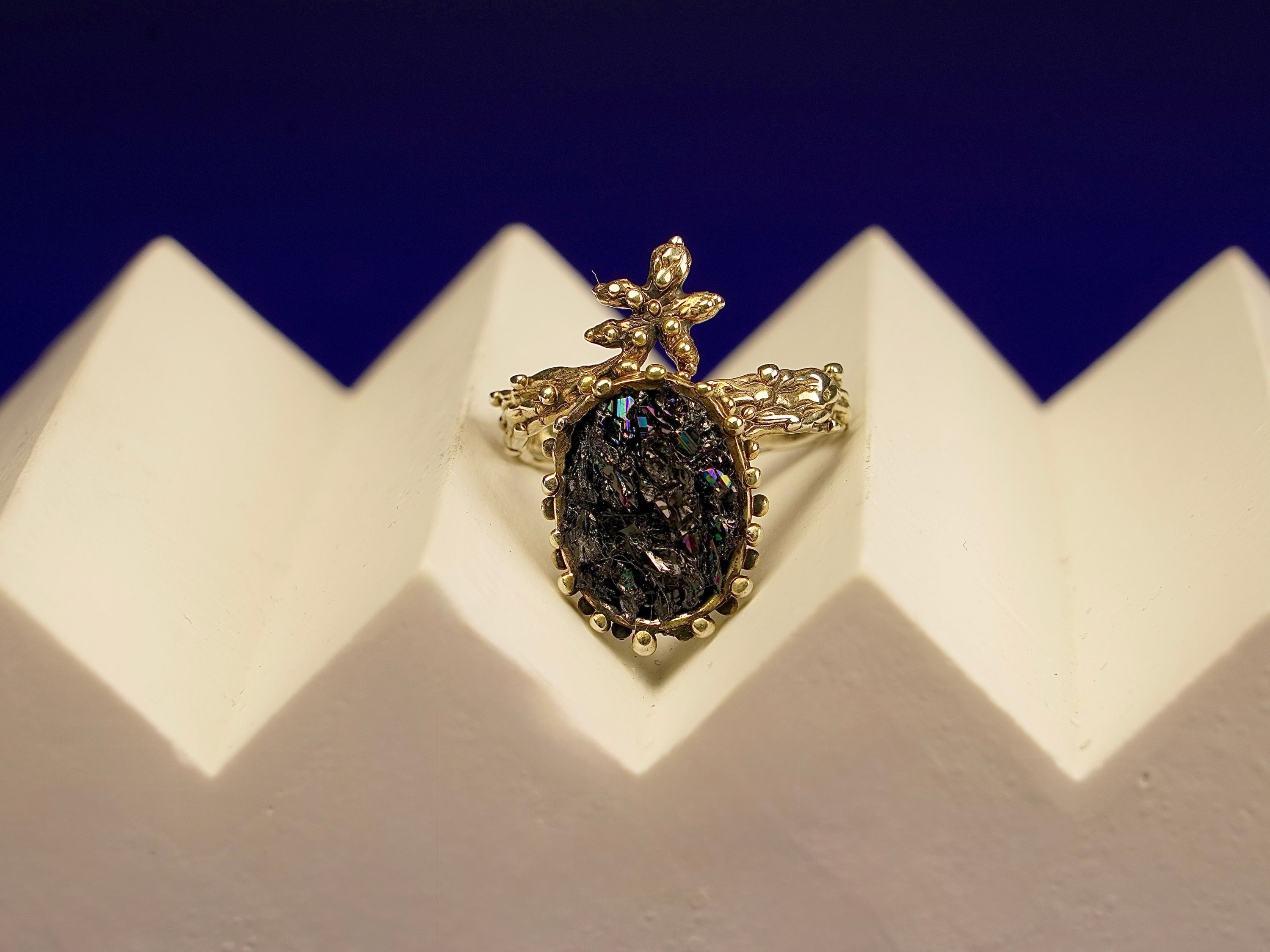 Clean front view ornate tourmaline ring crown design silver statement jewelry