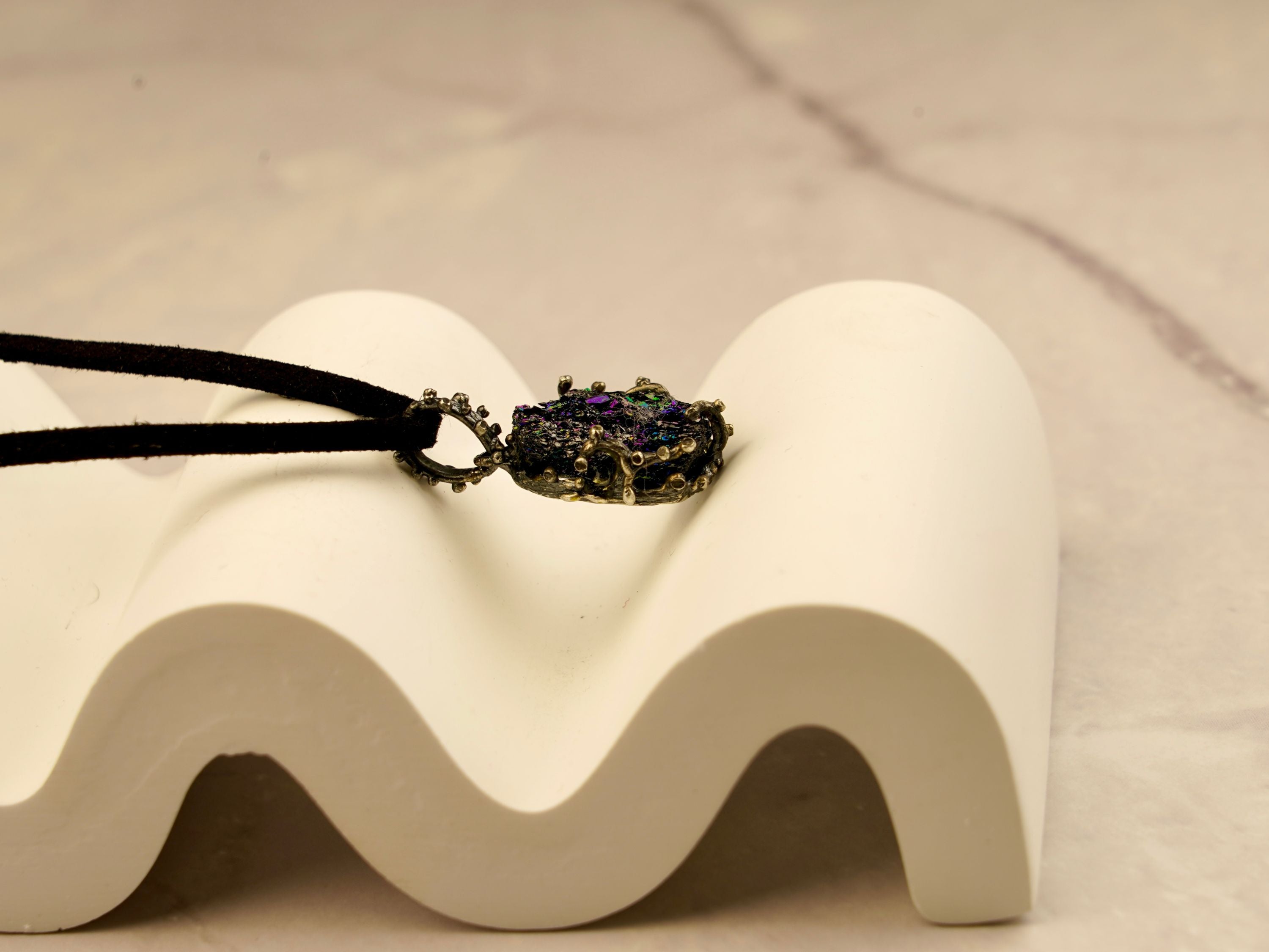 black tourmaline necklace clean minimal background gothic pendant