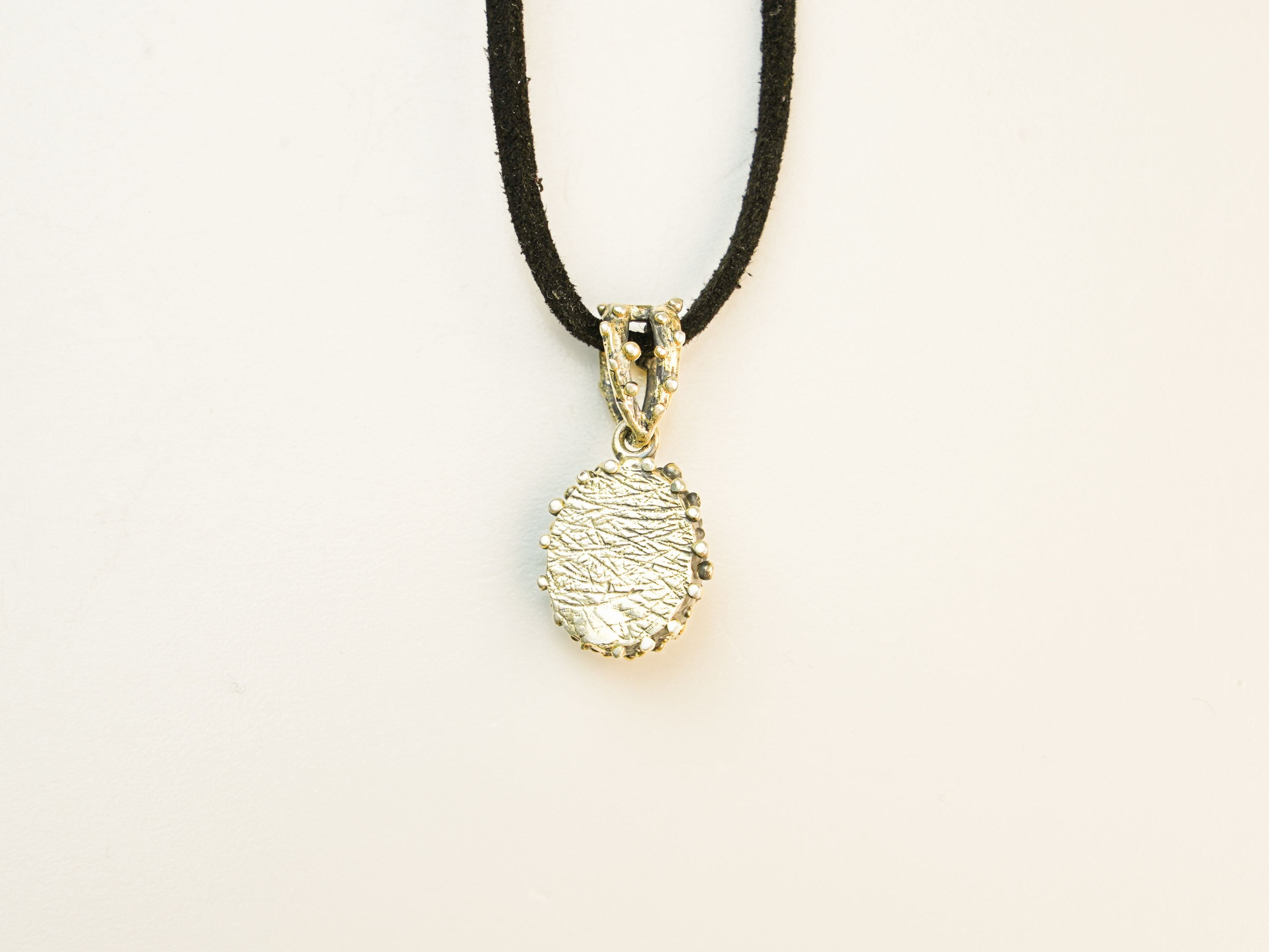 backside pyrite pendant sterling silver craftsmanship detail