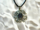 tourmaline pendant necklace front view, intricate silver design with raw crystal