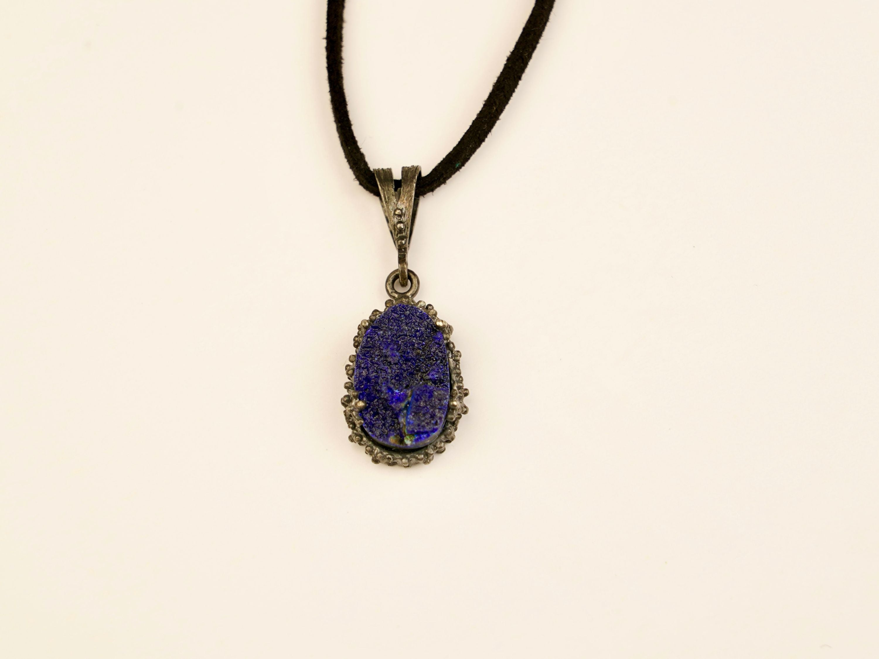 lapis lazuli pendant necklace front view, raw crystal silver design