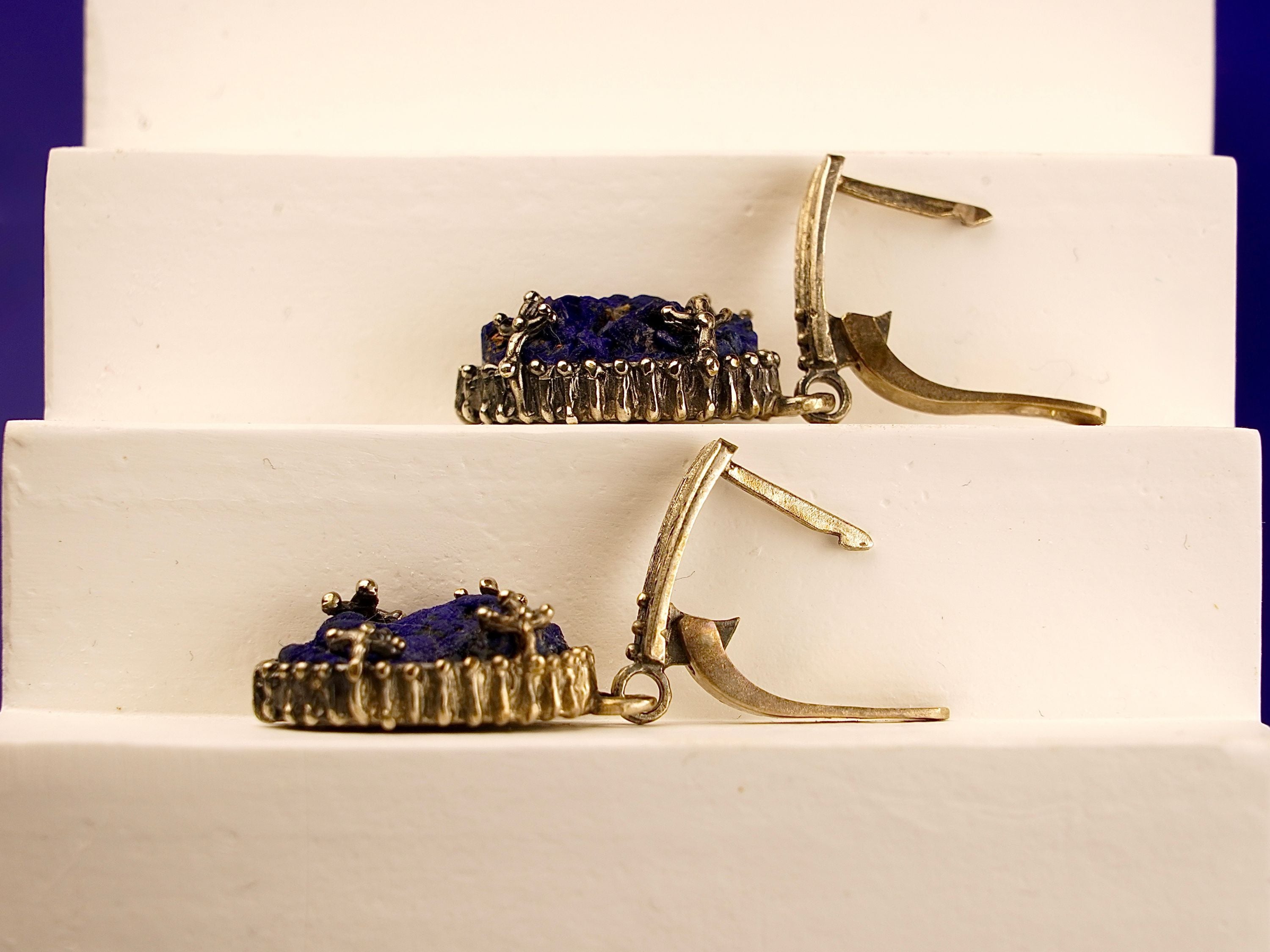 Angle view lapis lazuli earrings blue gemstone silver drop earrings perspective