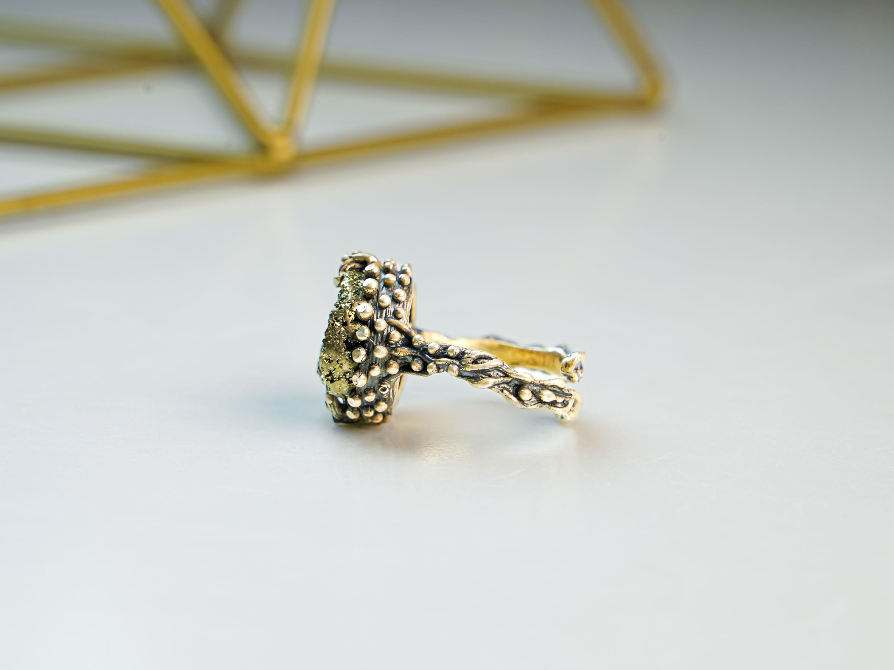 Pyrite ring side view sterling silver band raw gold stone statement design