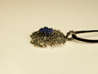 lapis lazuli necklace side angle blue gemstone statement pendant