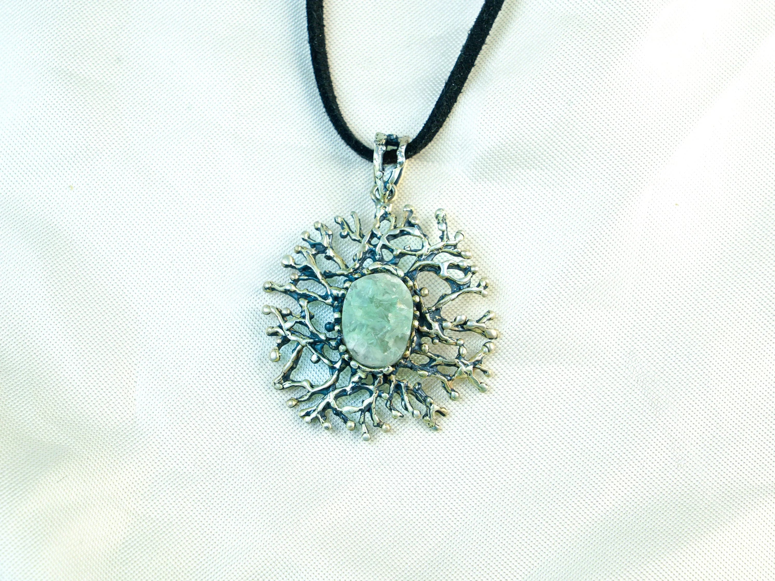 Aquamarine necklace centered view blue gemstone silver pendant design
